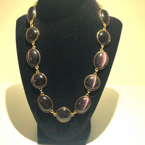 Vintage purple stones set in faux gold!